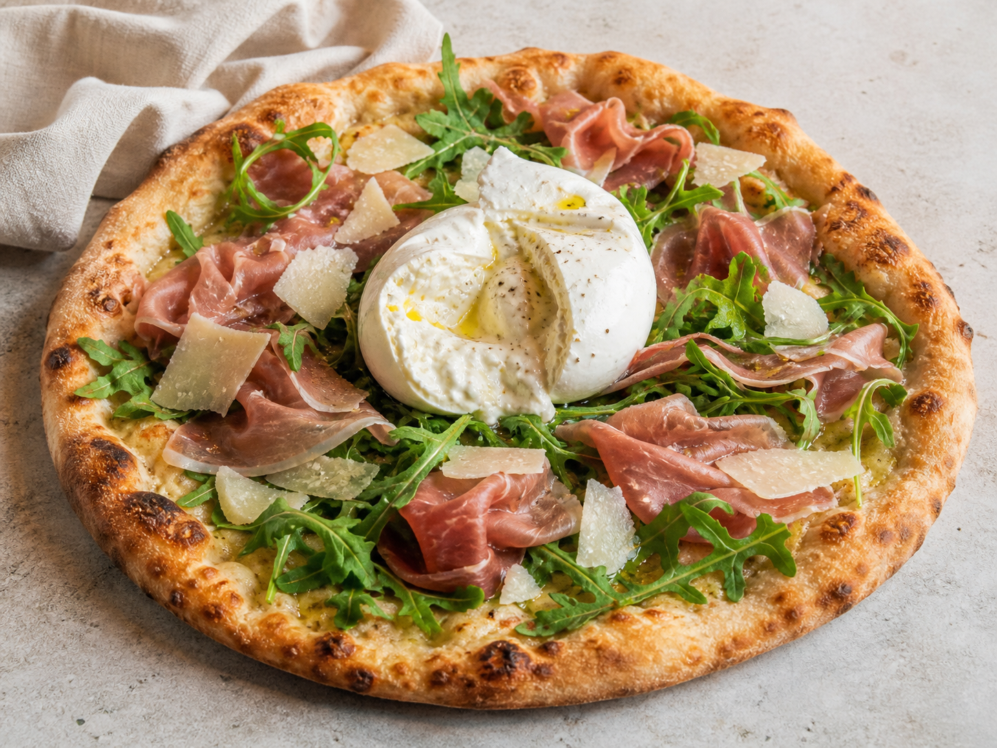 Prosciutto rocket and burrata pizza